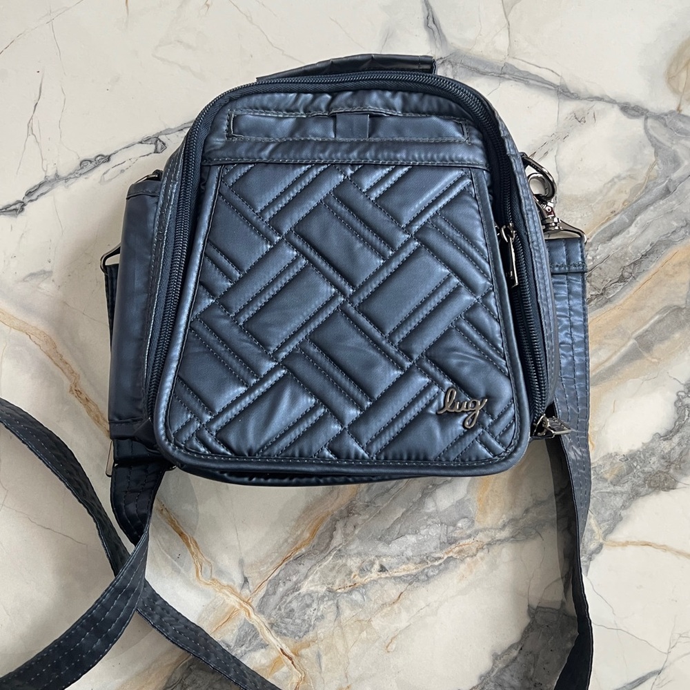 Lug Flapper SE Metallic Indigo Crossbody bag